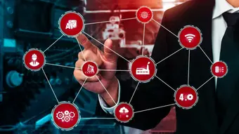 The picture shows an artistic expression of a specialist who manages a factory using new technologies, such as: AI, Wi-Fi, and cloud computing.