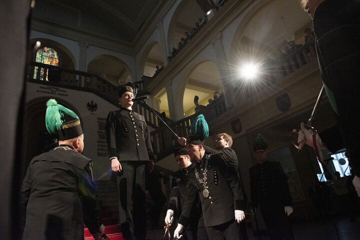 A decorative image of a mining ceremony