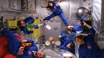 An image of a group of student astronauts in an analogue space mission centre.