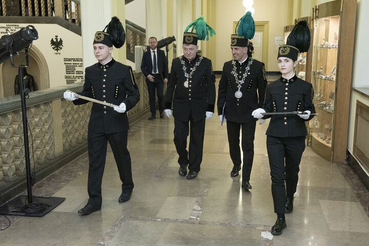 A decorative image of a mining ceremony