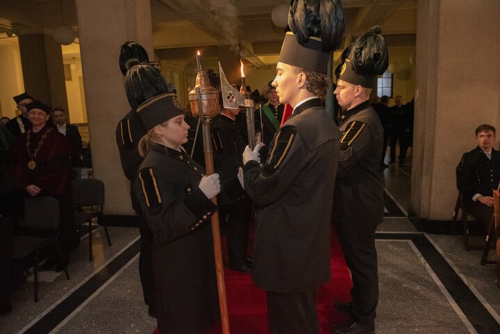 A decorative image of a mining ceremony