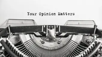An image of a sheet of paper in a typewriter with a message "Your opinion matters"