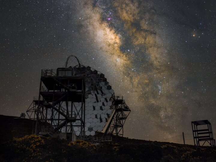  Observatory telescope beneath a star-filled night sky.