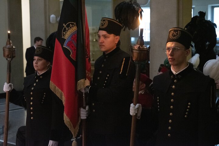 A decorative image of a mining ceremony