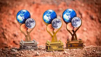 Image of three ERC statuettes on a Martian track