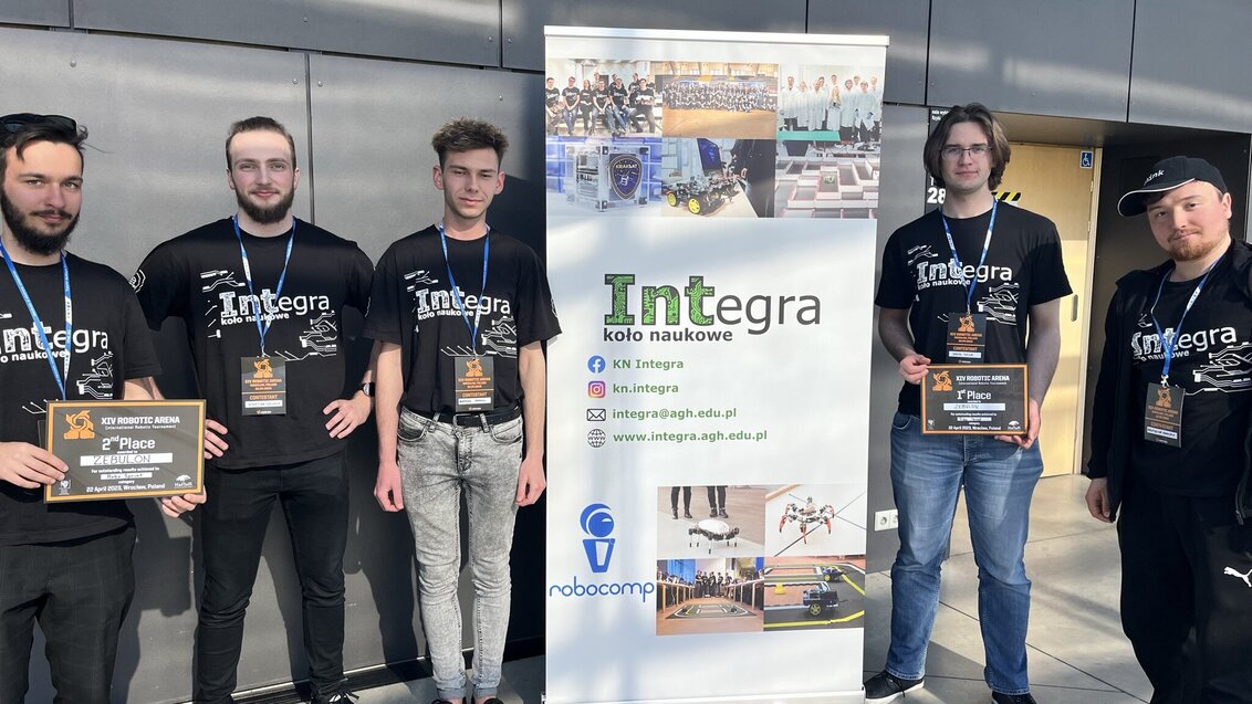 The photo shows the members of the Integra AGH student research club posing with the diplomas for the first and second place in the competition.