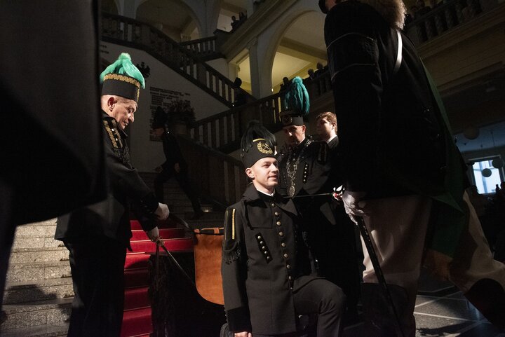 A decorative image of a mining ceremony