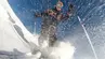 A creative photograph of a skier from below.