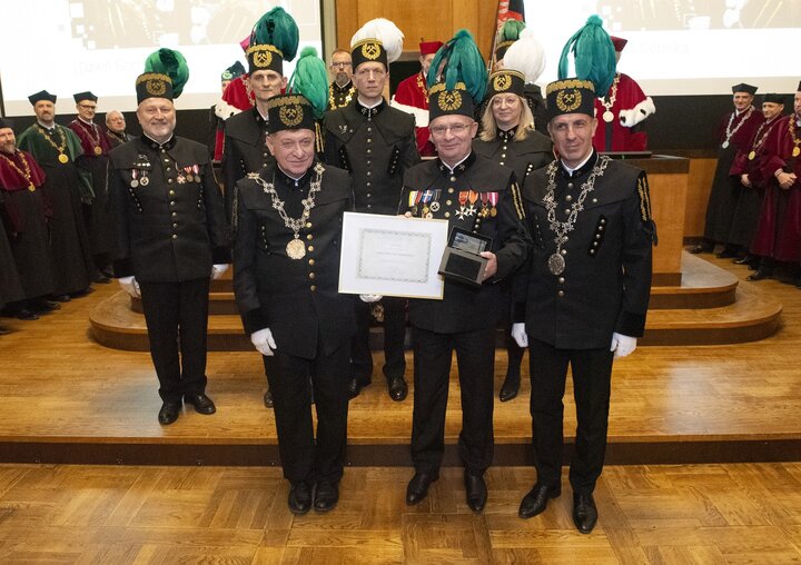 A decorative image of a mining ceremony