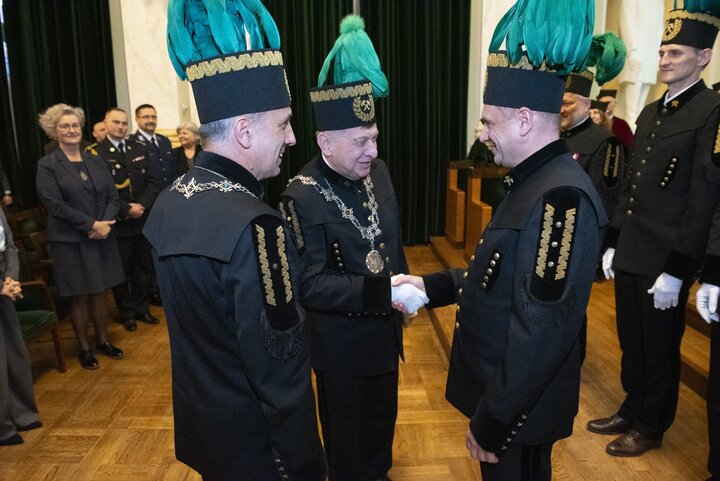 A decorative image of a mining ceremony