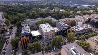 A drone image of a modern building located on the AGH University campus.