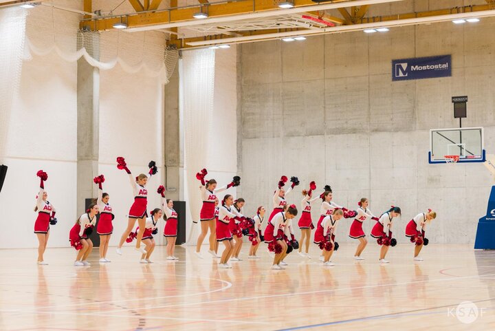 dancing cheerleaders in the middle of the new sports hall