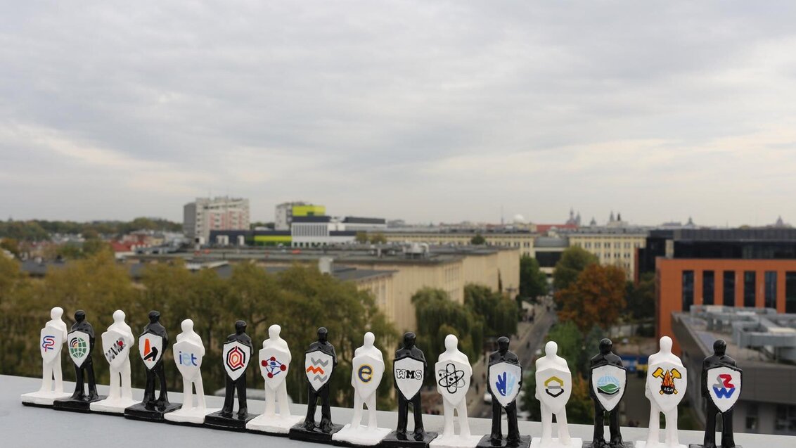 image of personalised chess pawns on the background of a city