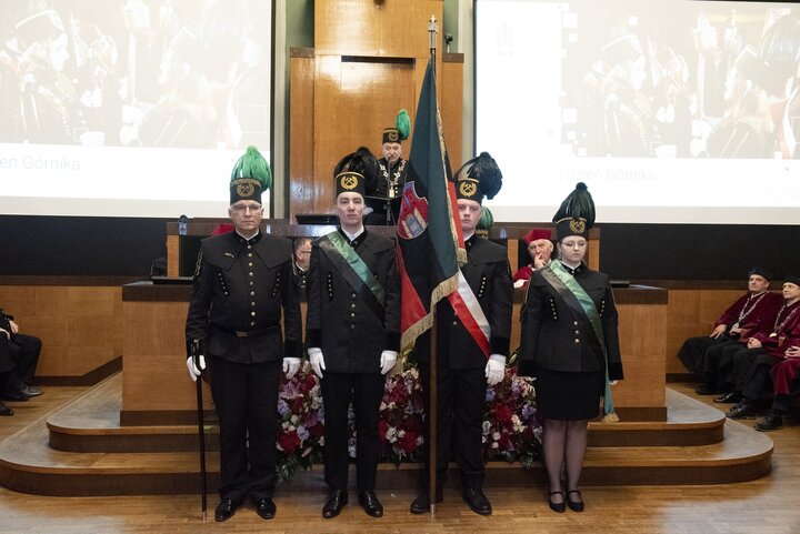 A decorative image of a mining ceremony