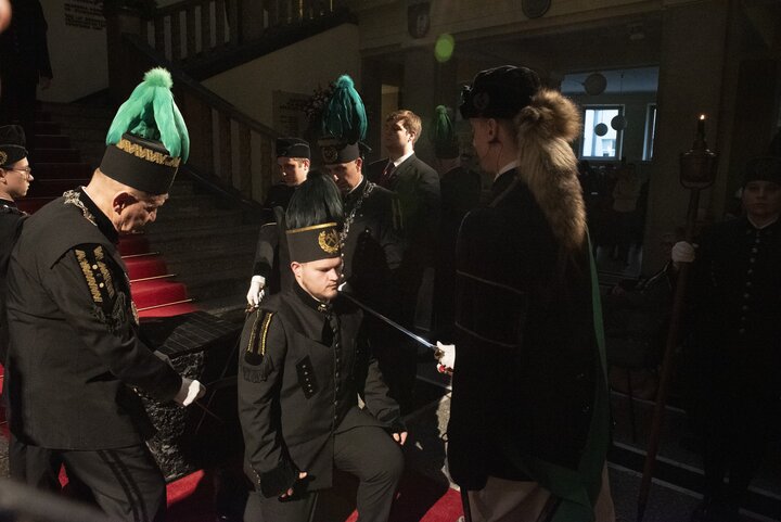 A decorative image of a mining ceremony