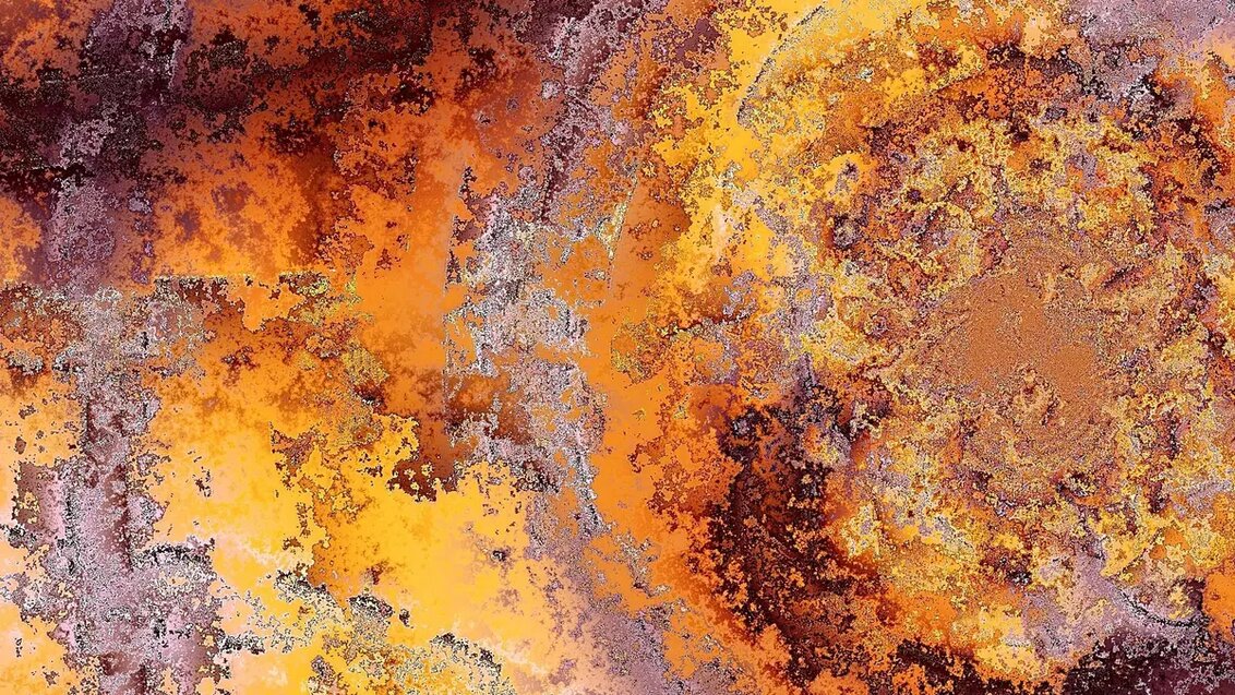 Close-up of a rusted metal surface with intricate patterns and textures in shades of orange, brown, yellow.